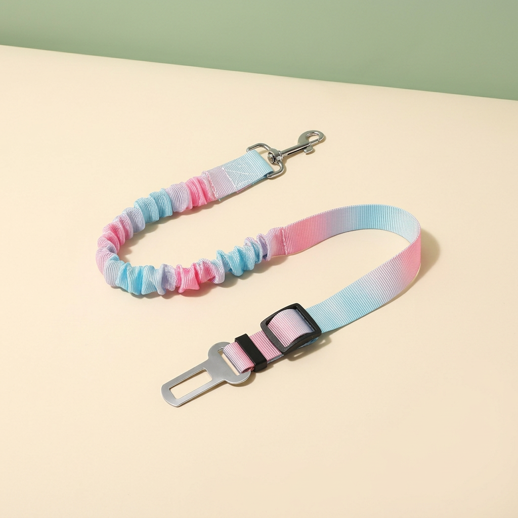 Blue and pink gradient bungee car tether with snap hook and seatbelt connector on ivory